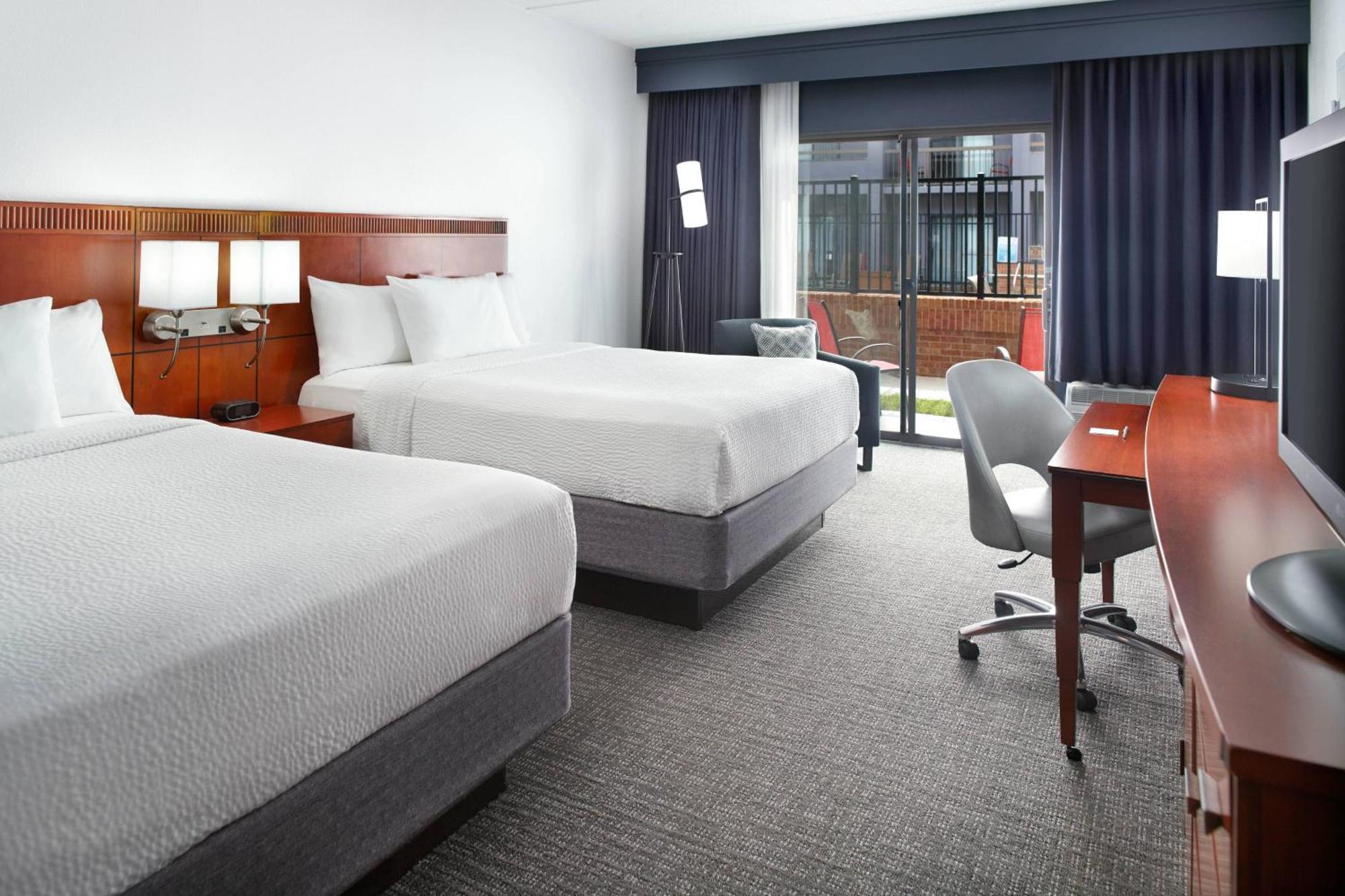 Courtyard By Marriott Raleigh Midtown Hotel Exterior photo